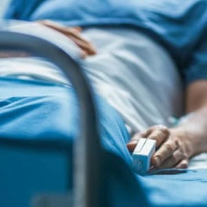 A patient on a hospital bed.